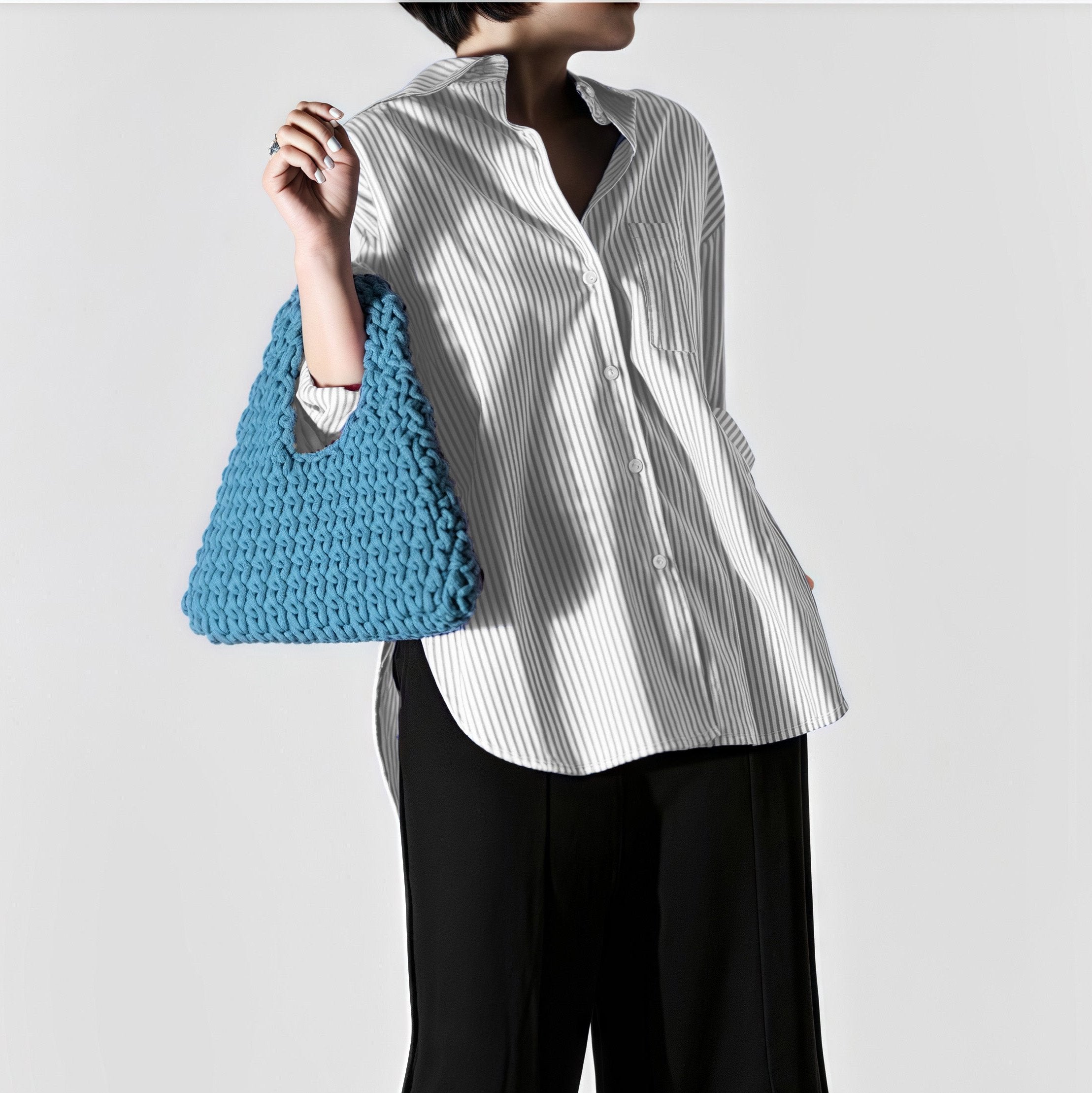 DIANNA luxury handcrafted handbag in timeless ocean blue, a statement of elegance and sustainable fashion.