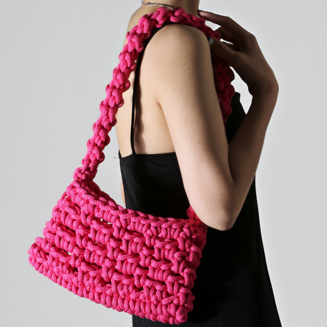 ELLA luxury shoulder bag in fucsia, a bespoke fashion statement blending high-end style with sustainable craftsmanship.