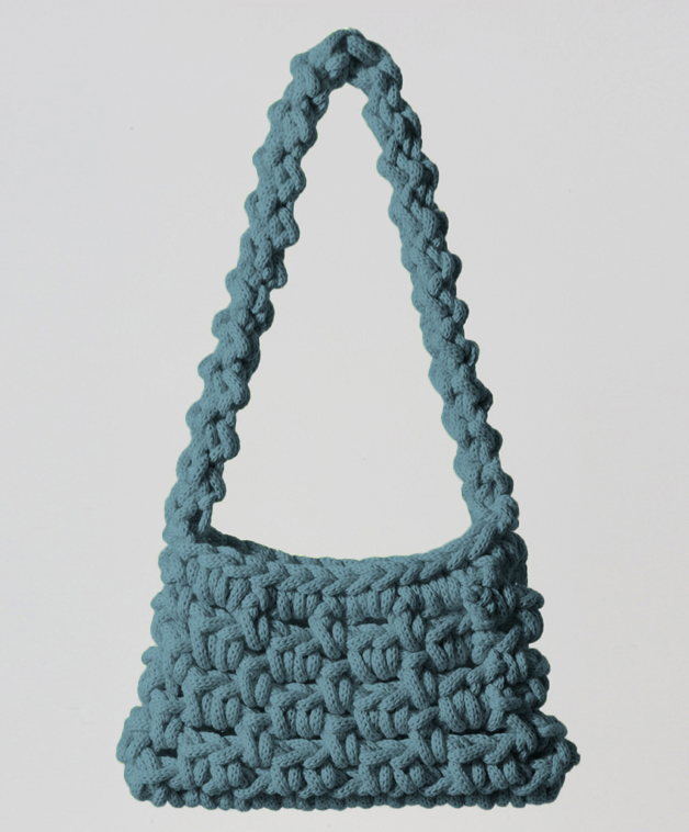 ELLA exclusive luxury shoulder bag in ocean blue, merging timeless style with ethical craftsmanship.