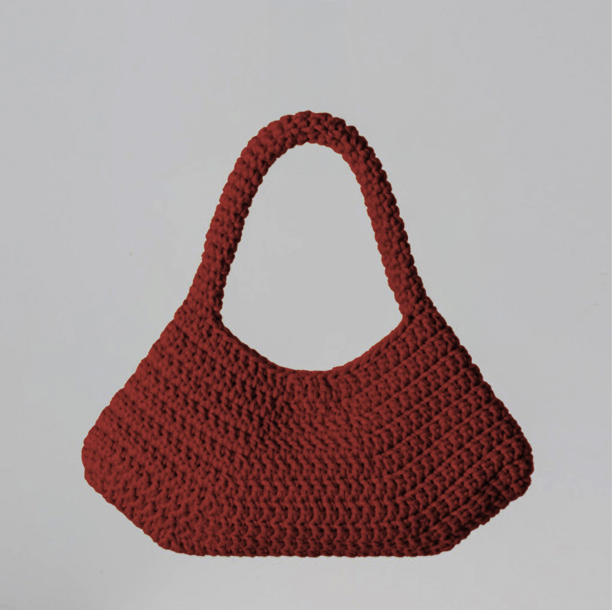 ETTA custom handmade shoulder bag in pure ginja, designed for luxury minimalism and eco-conscious elegance.