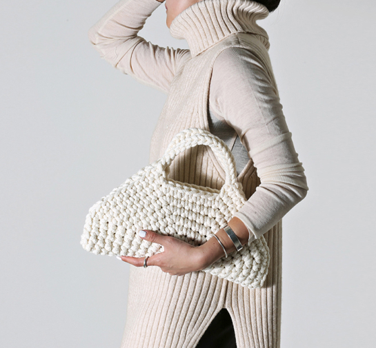 NINA luxury handcrafted handbag in timeless natural white, designed for elegance and sustainable fashion lovers.